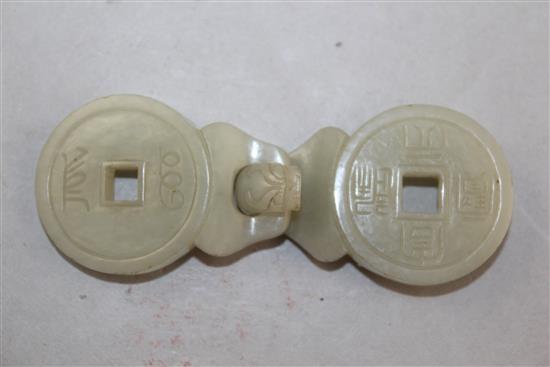 A Chinese celadon jade two piece belt buckle, 19th century, 9.8cm